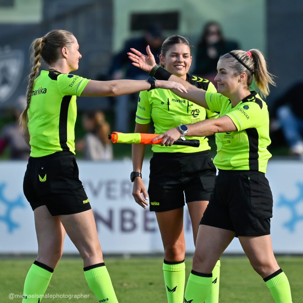 Referees post match.